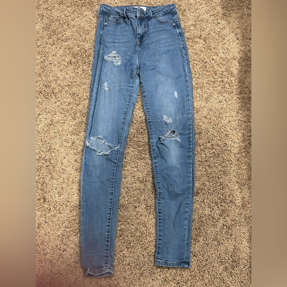 high wasted light wash ripped skinny jeans